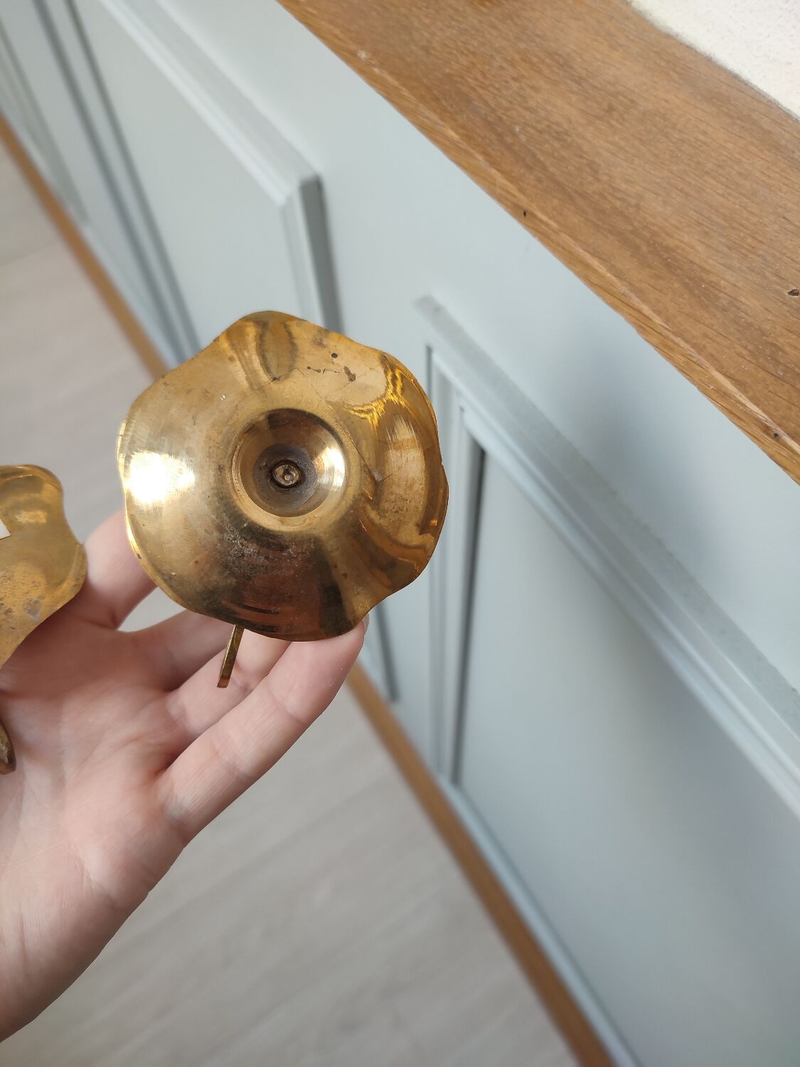 Brass hand candle holder