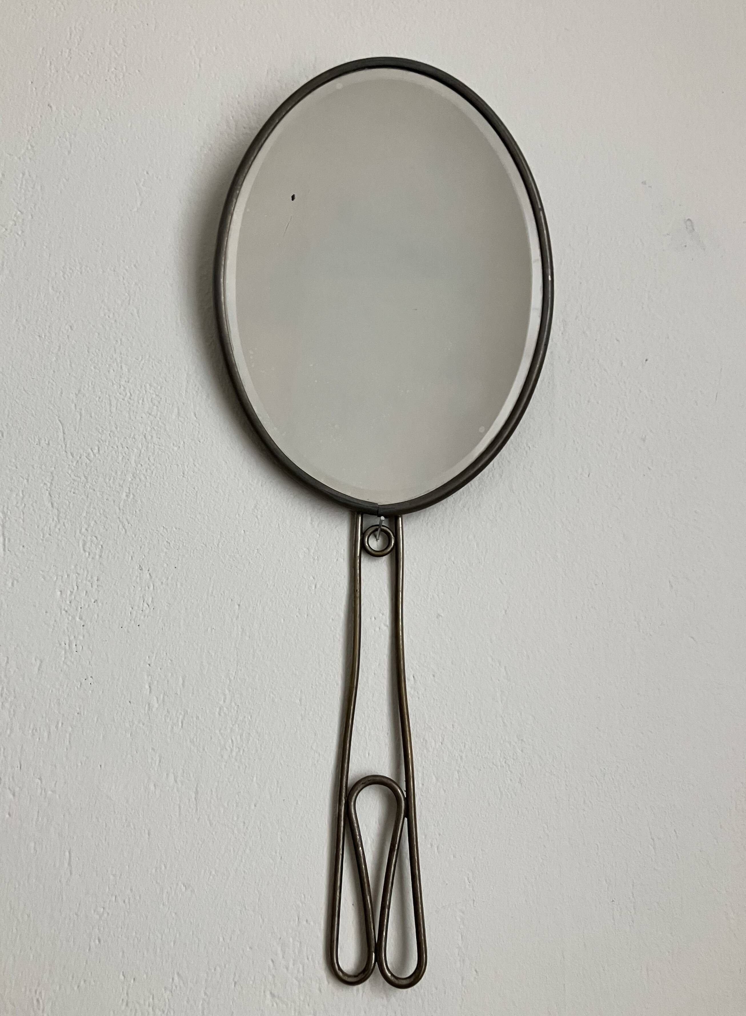 Early 20th century oval beveled mirror