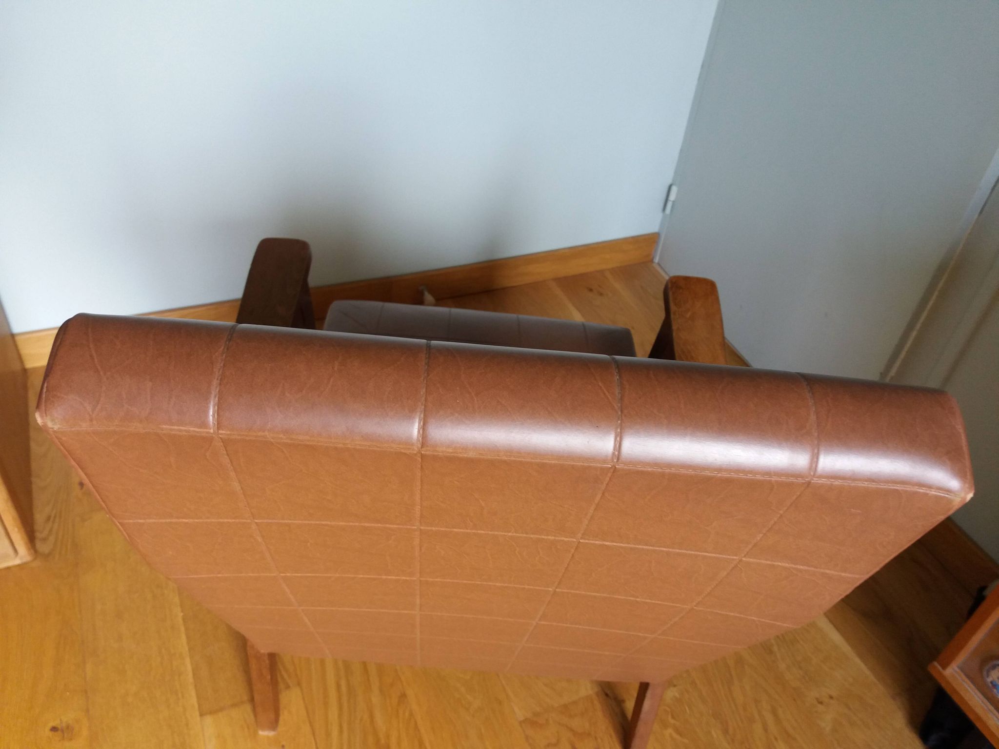Scandinavian brown skai and wood armchair