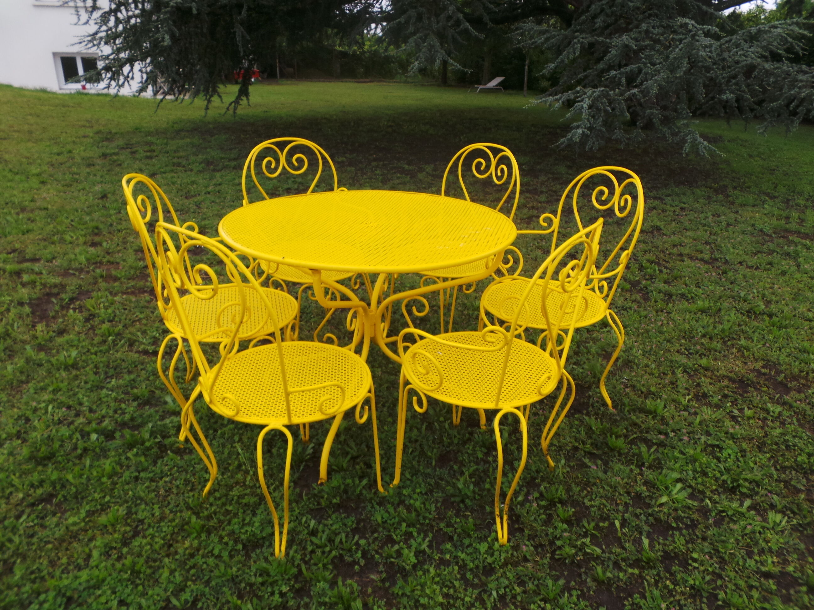 Yellow wrought iron garden room