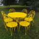 Yellow wrought iron garden room