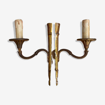 Pair of Louis XVI style wall lamps in bronze