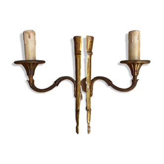 Pair of Louis XVI style wall lamps in bronze