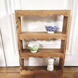 Scalloped frieze wall shelf