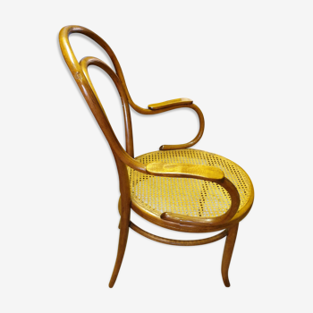 Ancien fauteuil en bois courbé et assise cannée