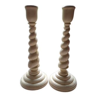 Pair of twisted wooden candle holders.