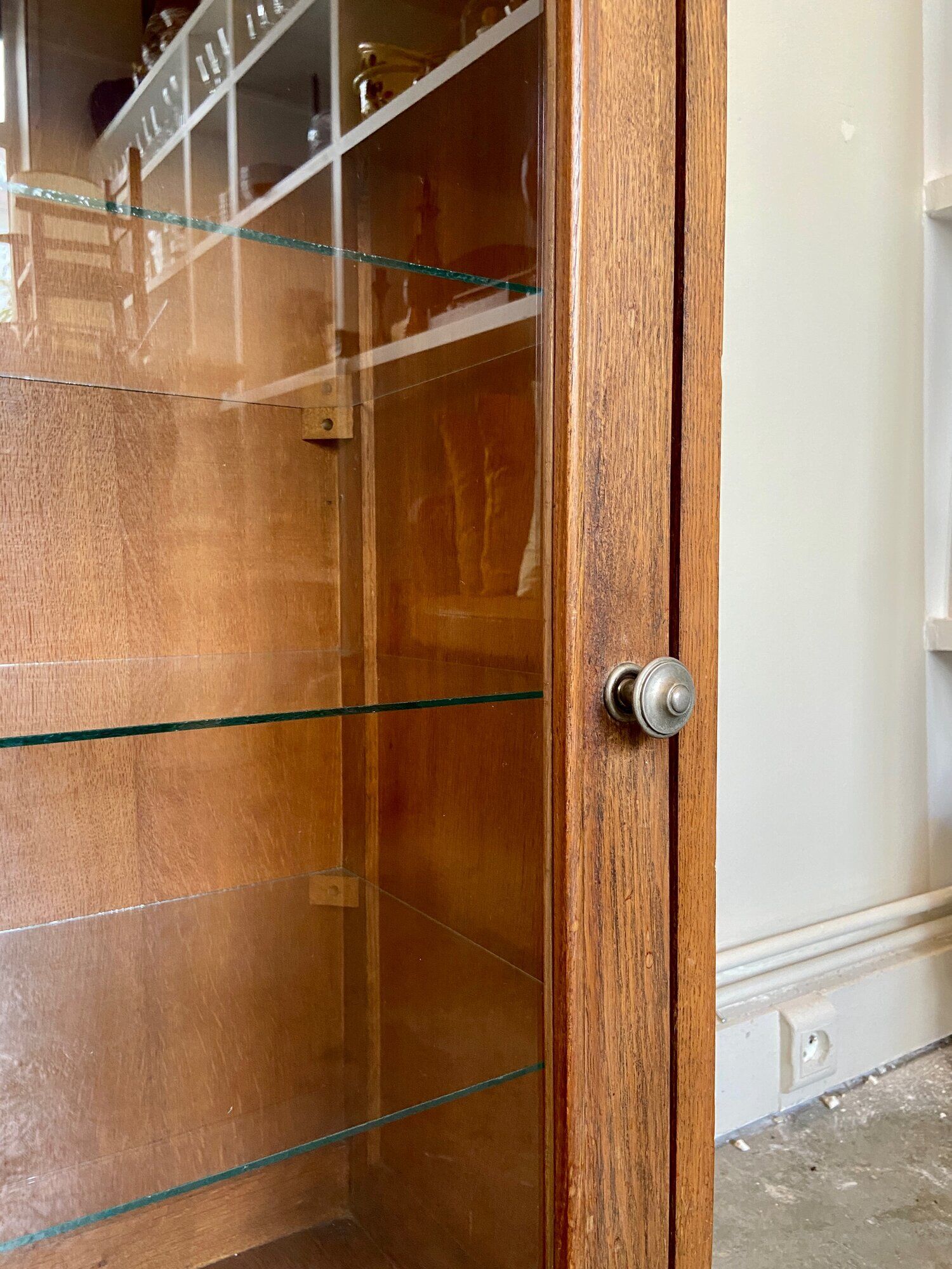 Dark wood display case and transparent glass