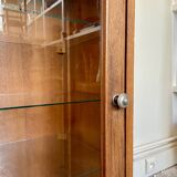 Dark wood display case and transparent glass