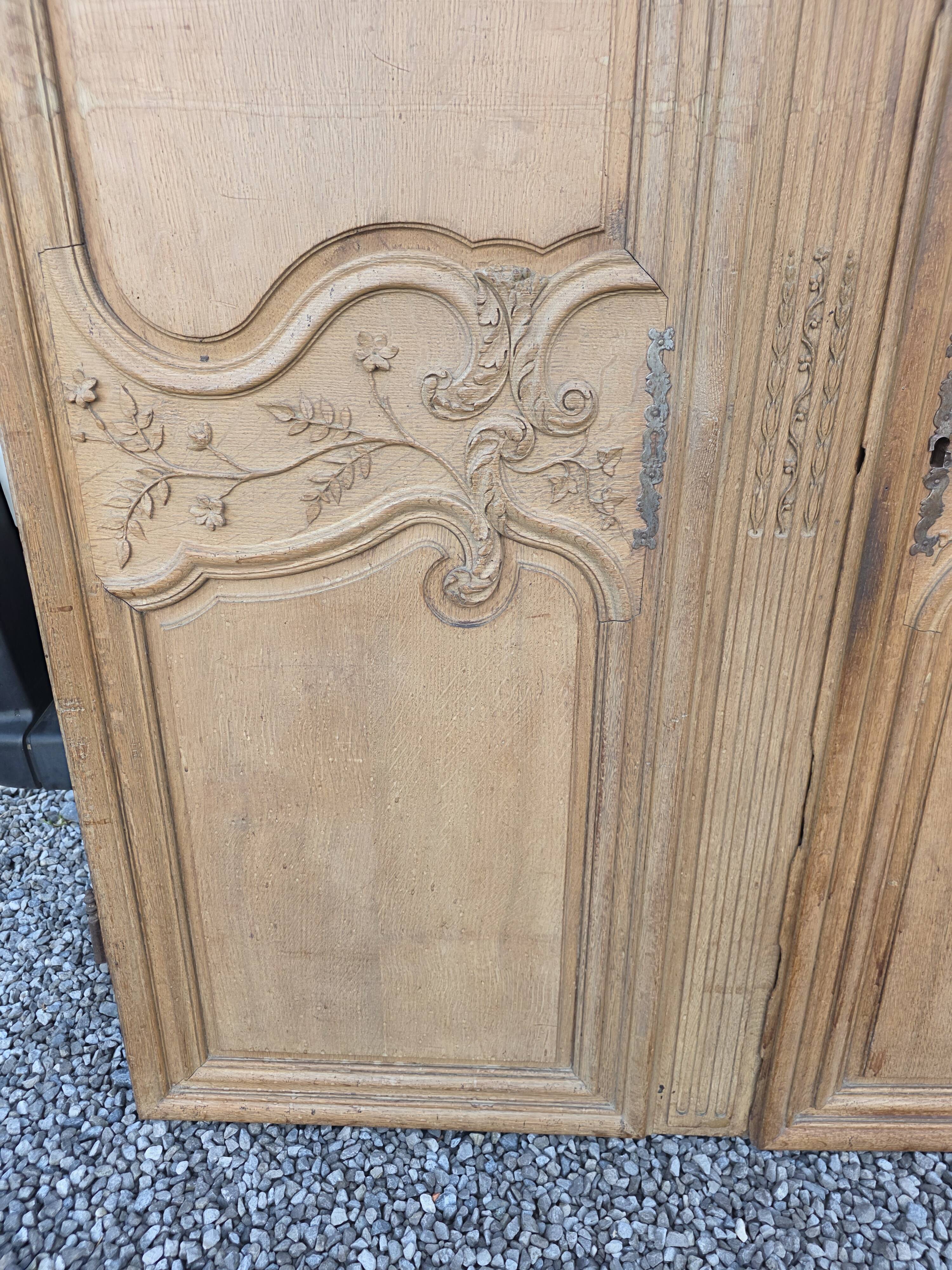 Pair of solid oak wardrobe doors from the 19th century.