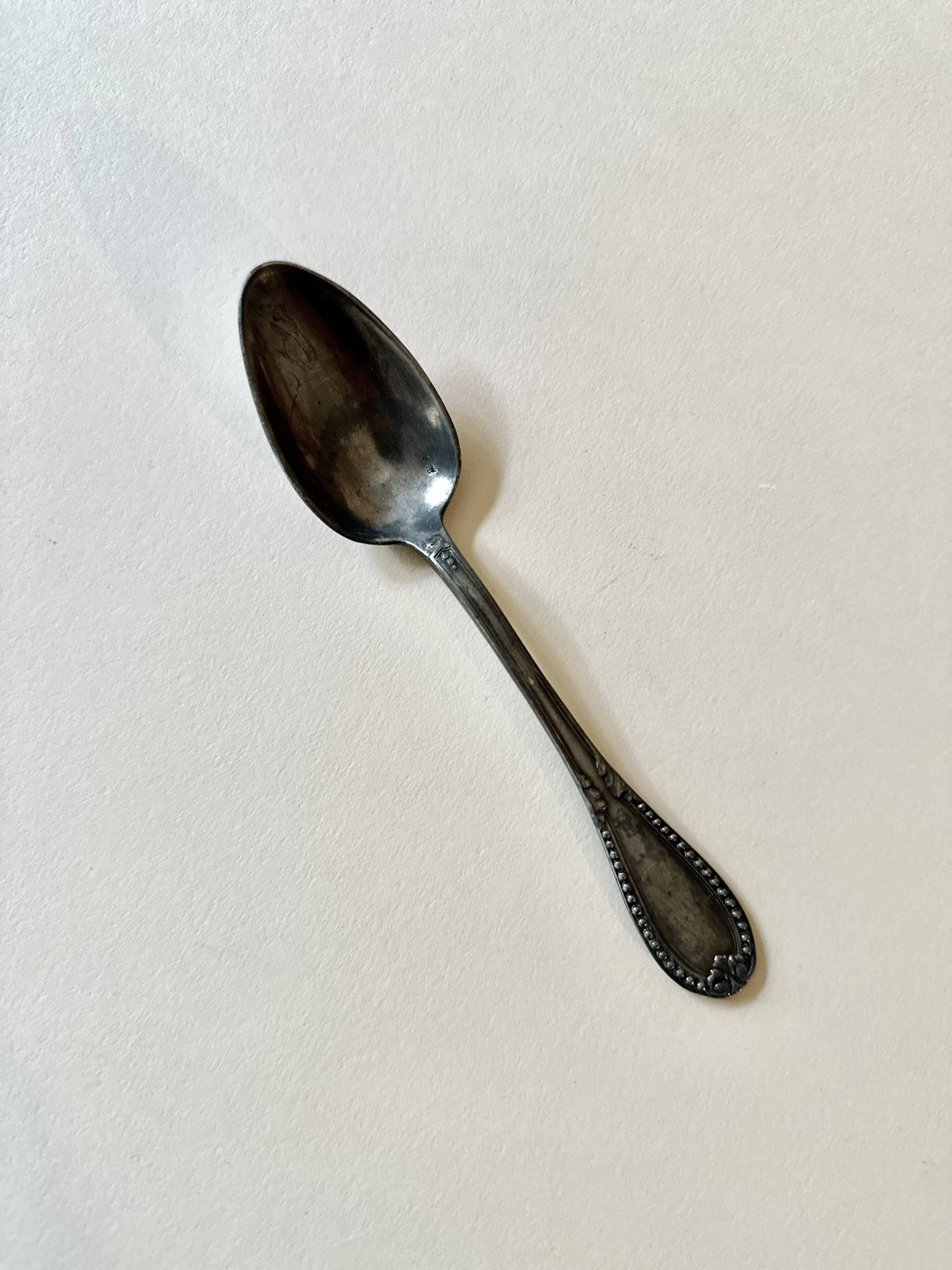 Service of 12 silver-plated dessert spoons