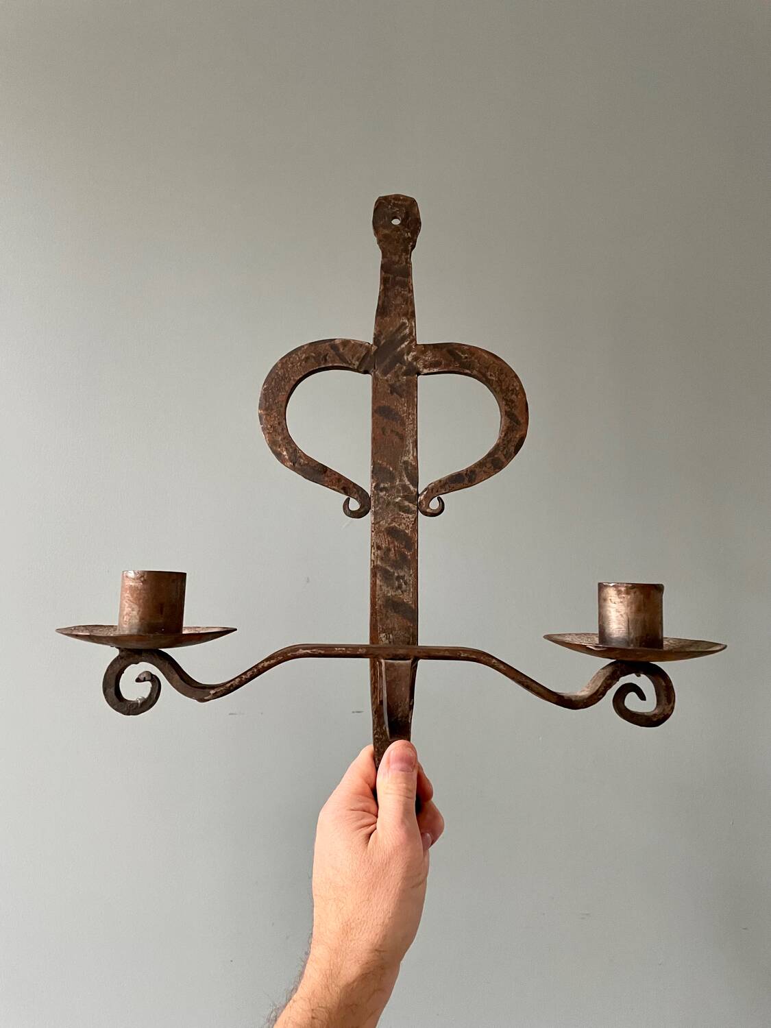 Brutalist wrought iron wall candle holder