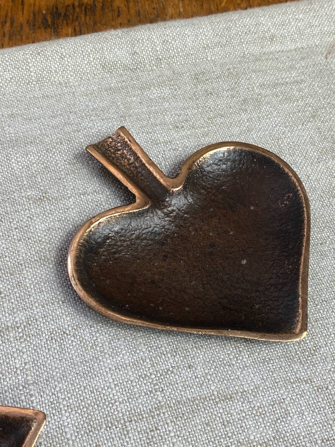 Bronze spade and diamond ashtrays