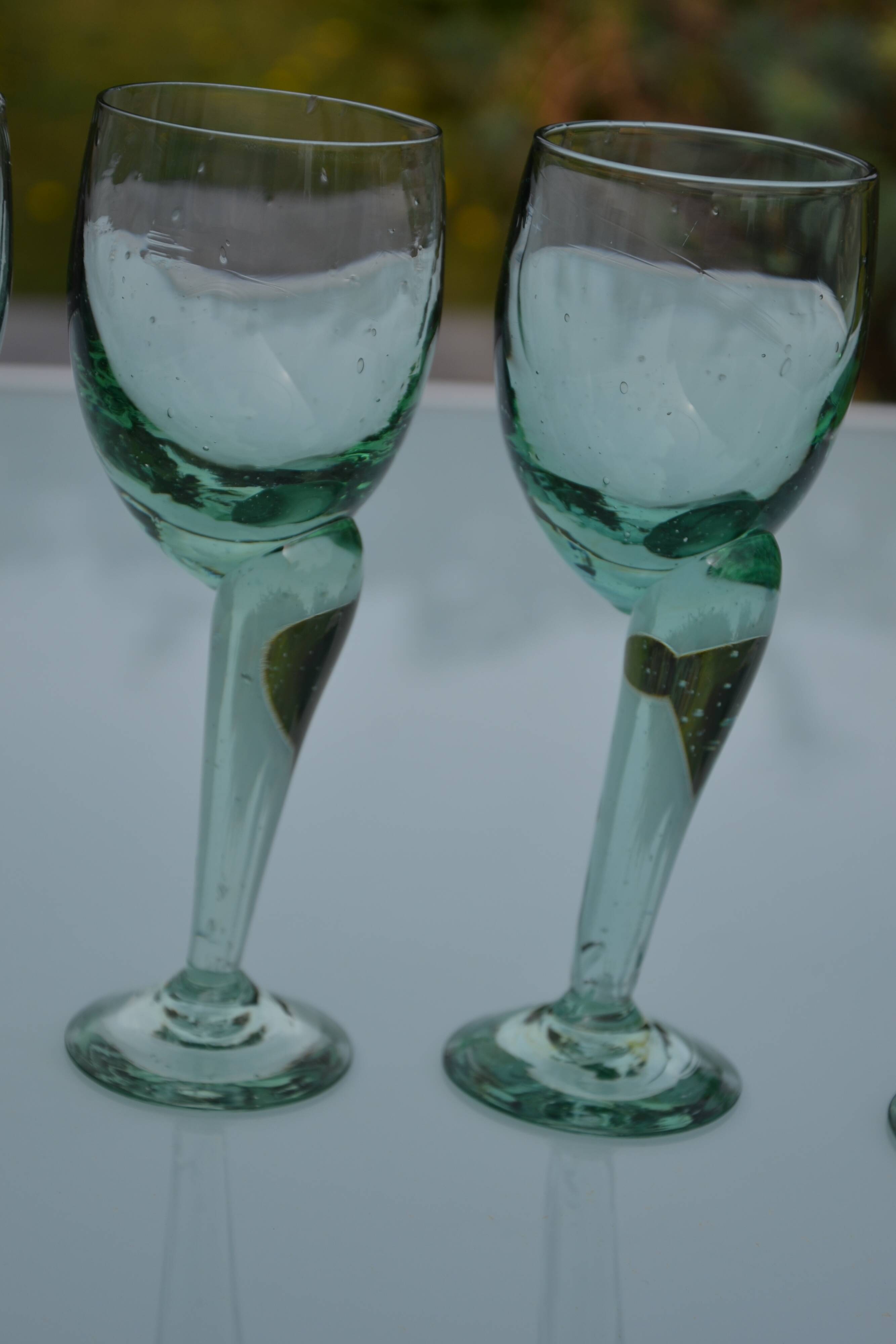 Hand-blown, bubbled stemmed glasses with offset feet