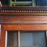 Scribanne bookcase in mahogany veneer English work of the twentieth century