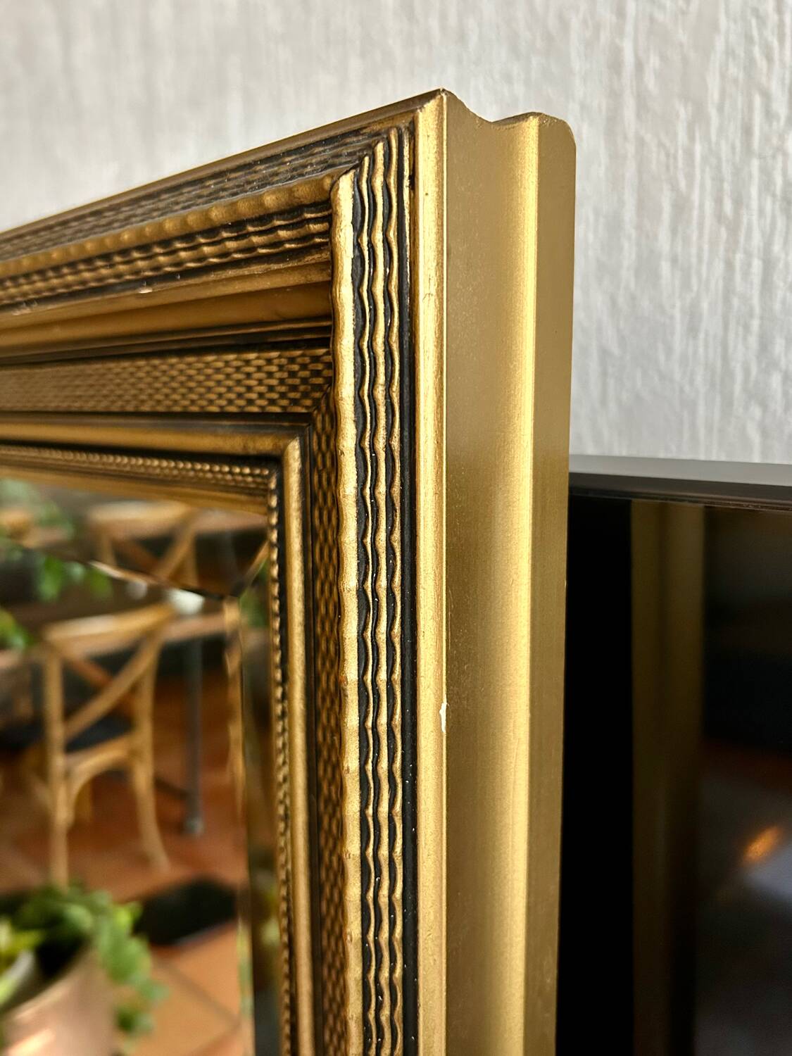 Large antique beveled mirror in the Napoleon III style - Gold and black frame