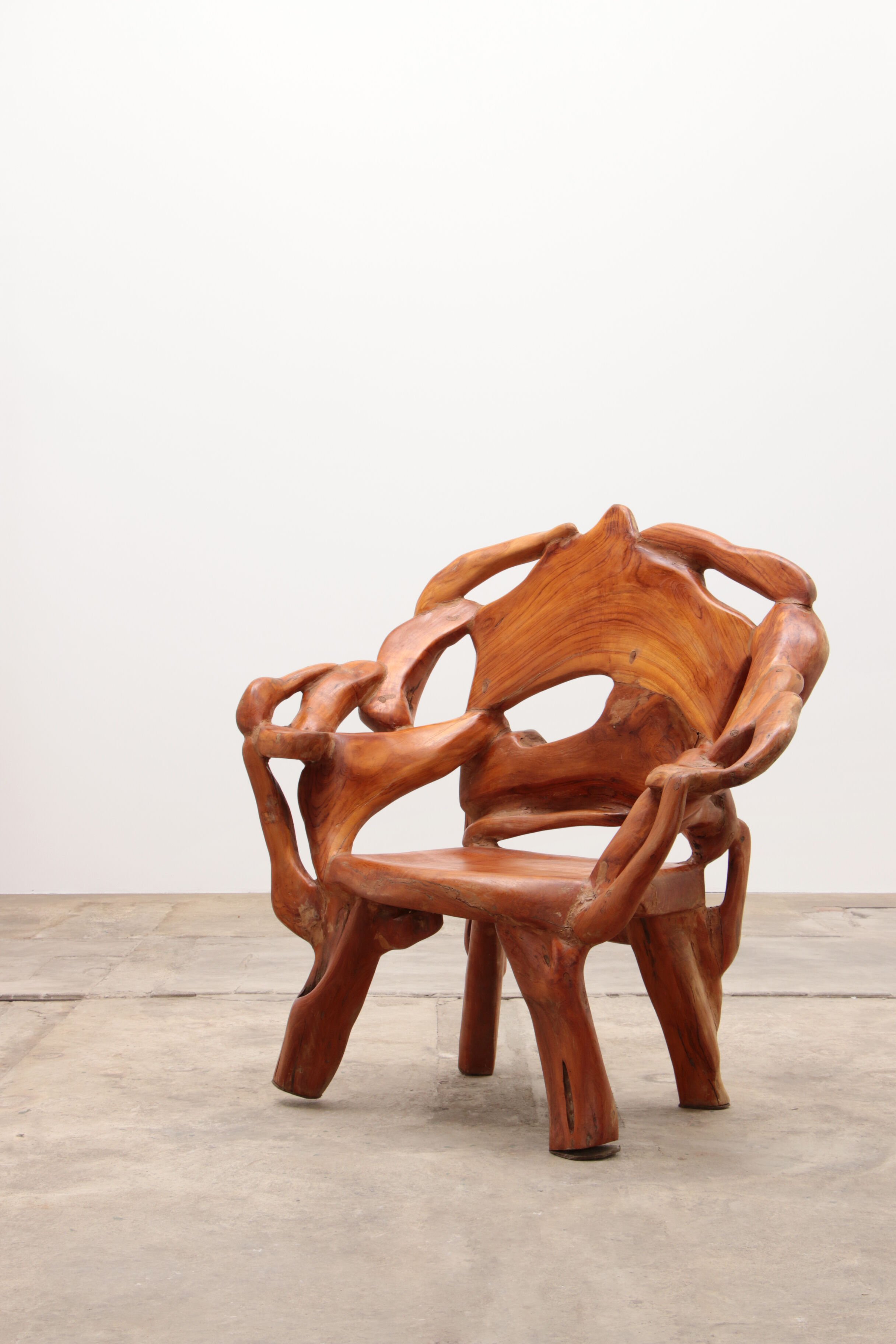 Robust armchair made of recycled wood