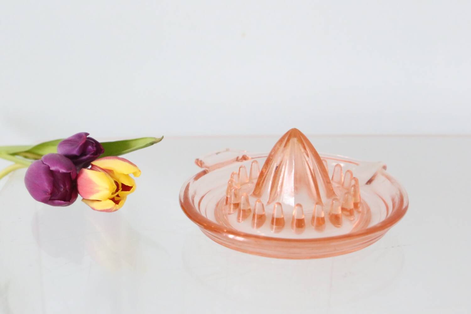 Adorable pink glass juicer