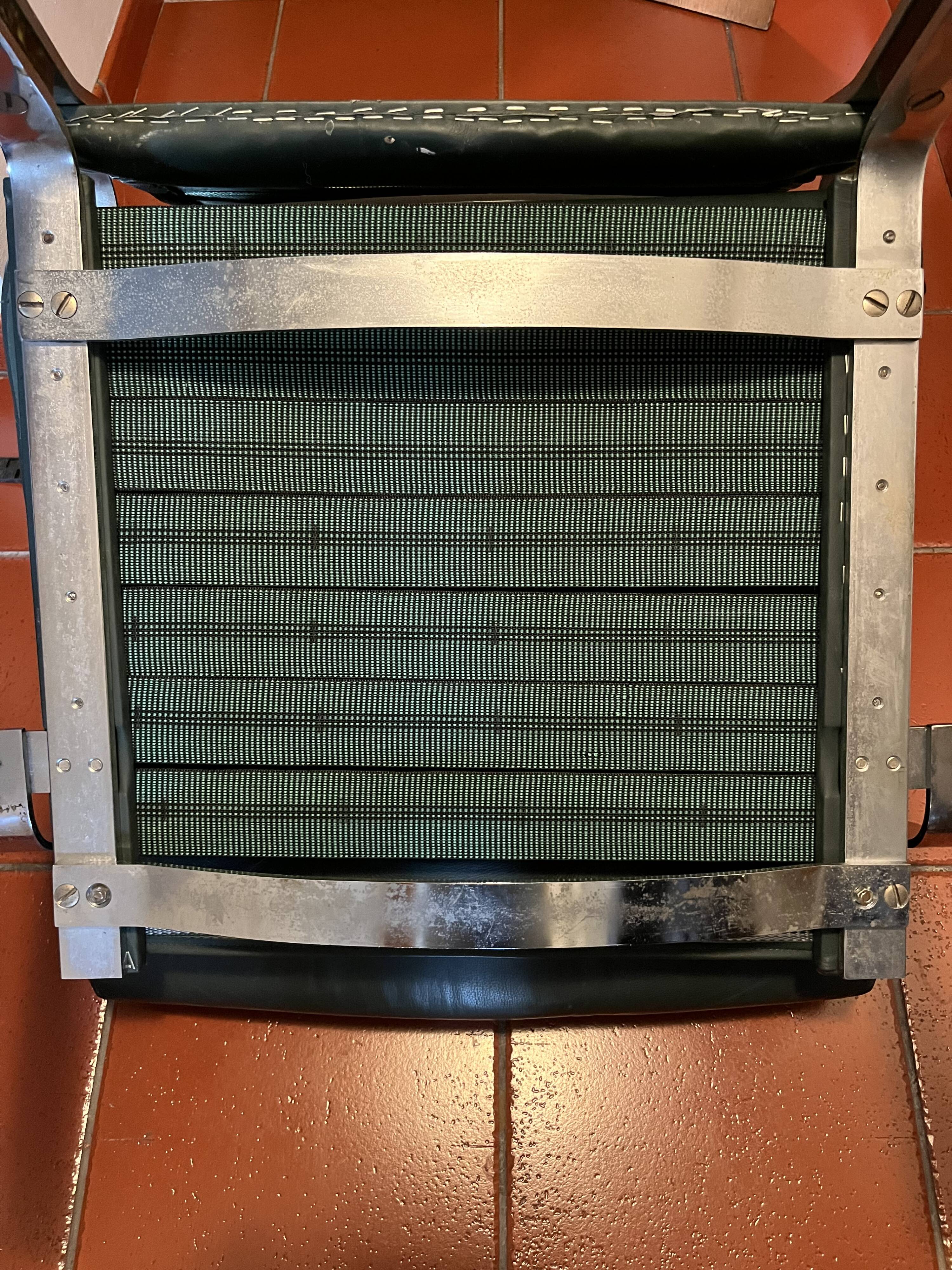 Green leather and chrome lounge chair, 1970s