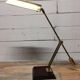 Brass and bakelite swing lamp 1980
