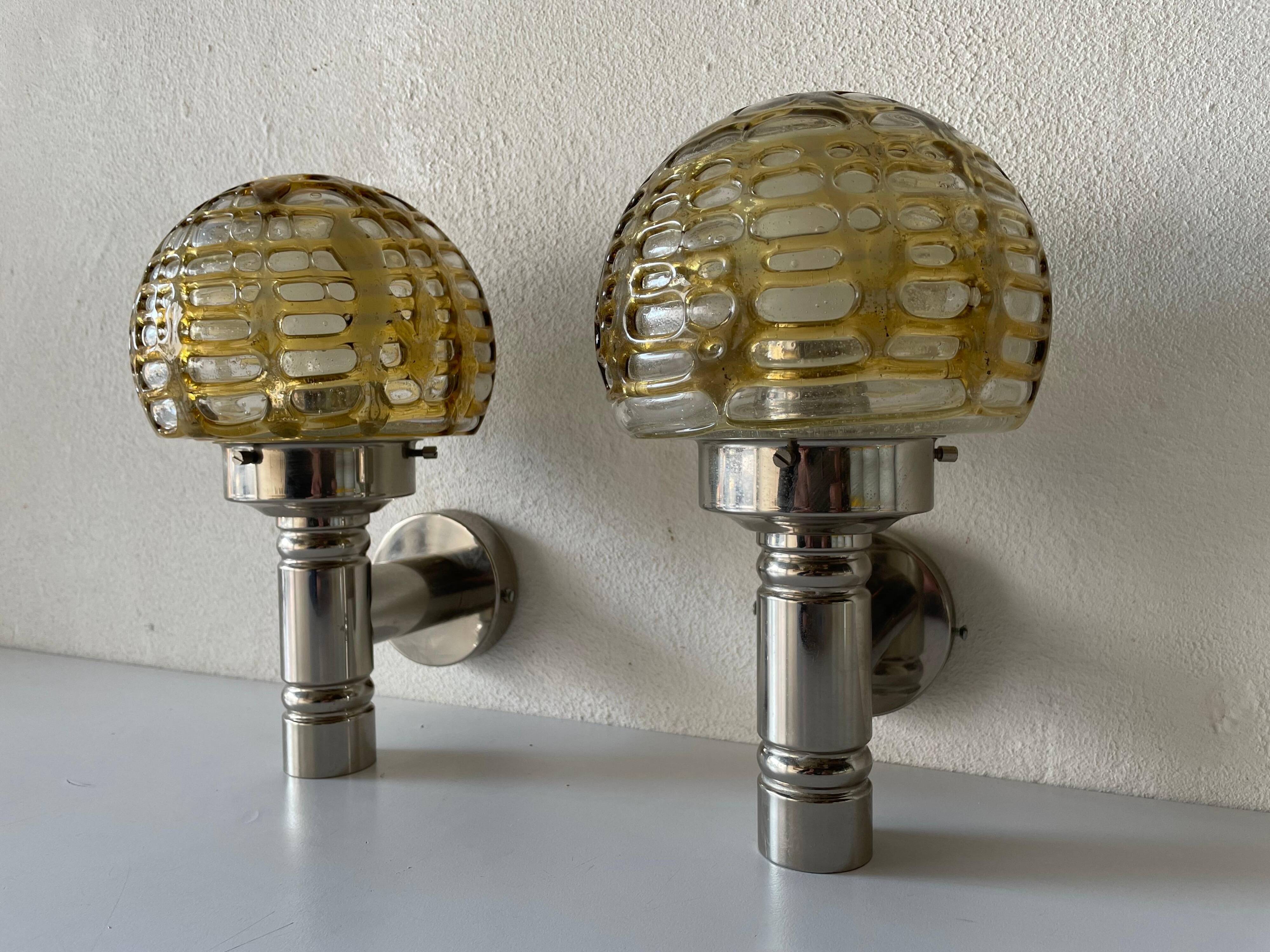 Rare pair of blown glass and chrome wall lights by Doria, 1960s, Germany.