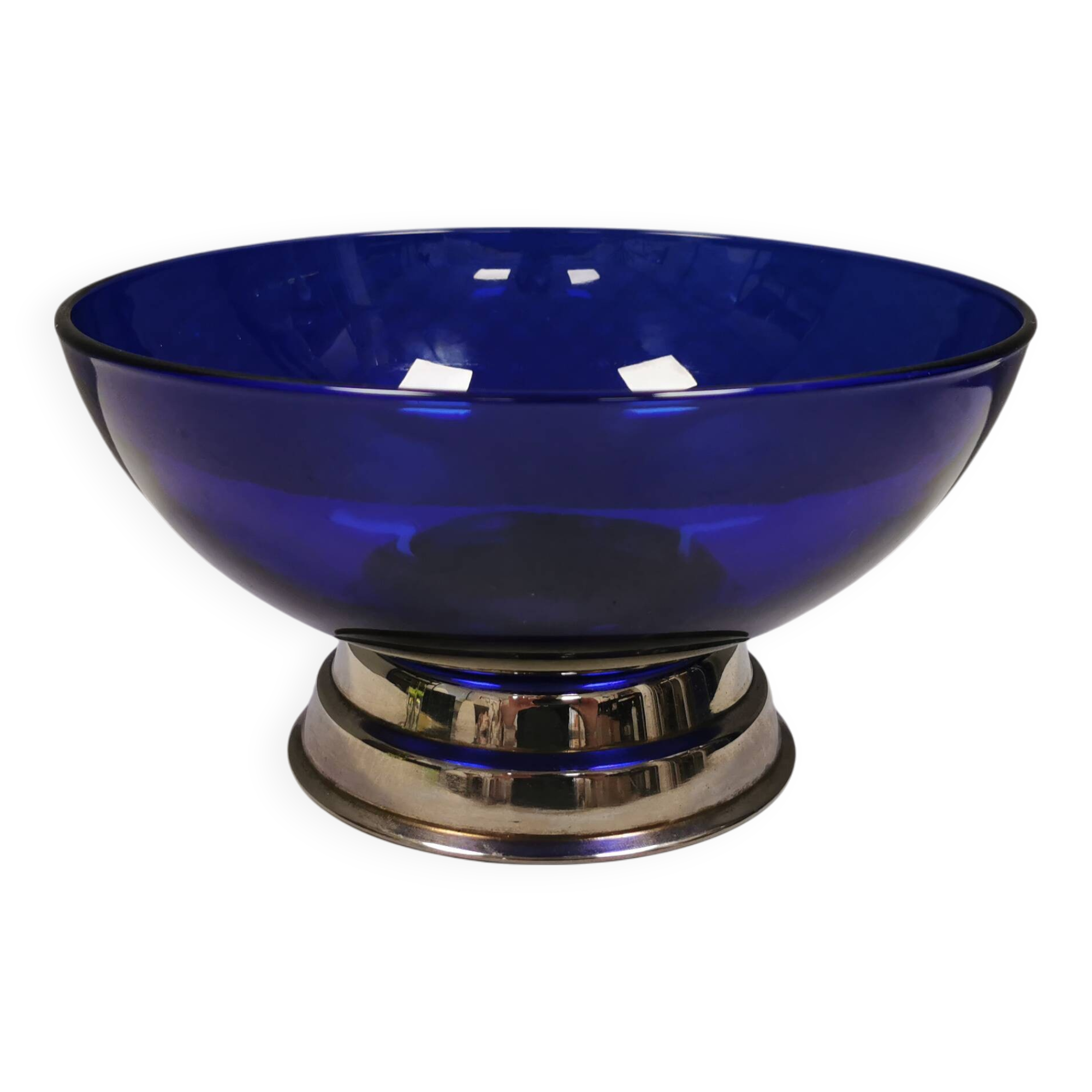 Beautiful blue glass bowl mounted on silver colored base (Original).