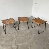 Set of three Raoul Guys wicker and metal stools
