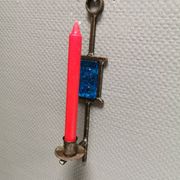 Wall-mounted candle holder in cast iron and hard pressed blue glass.