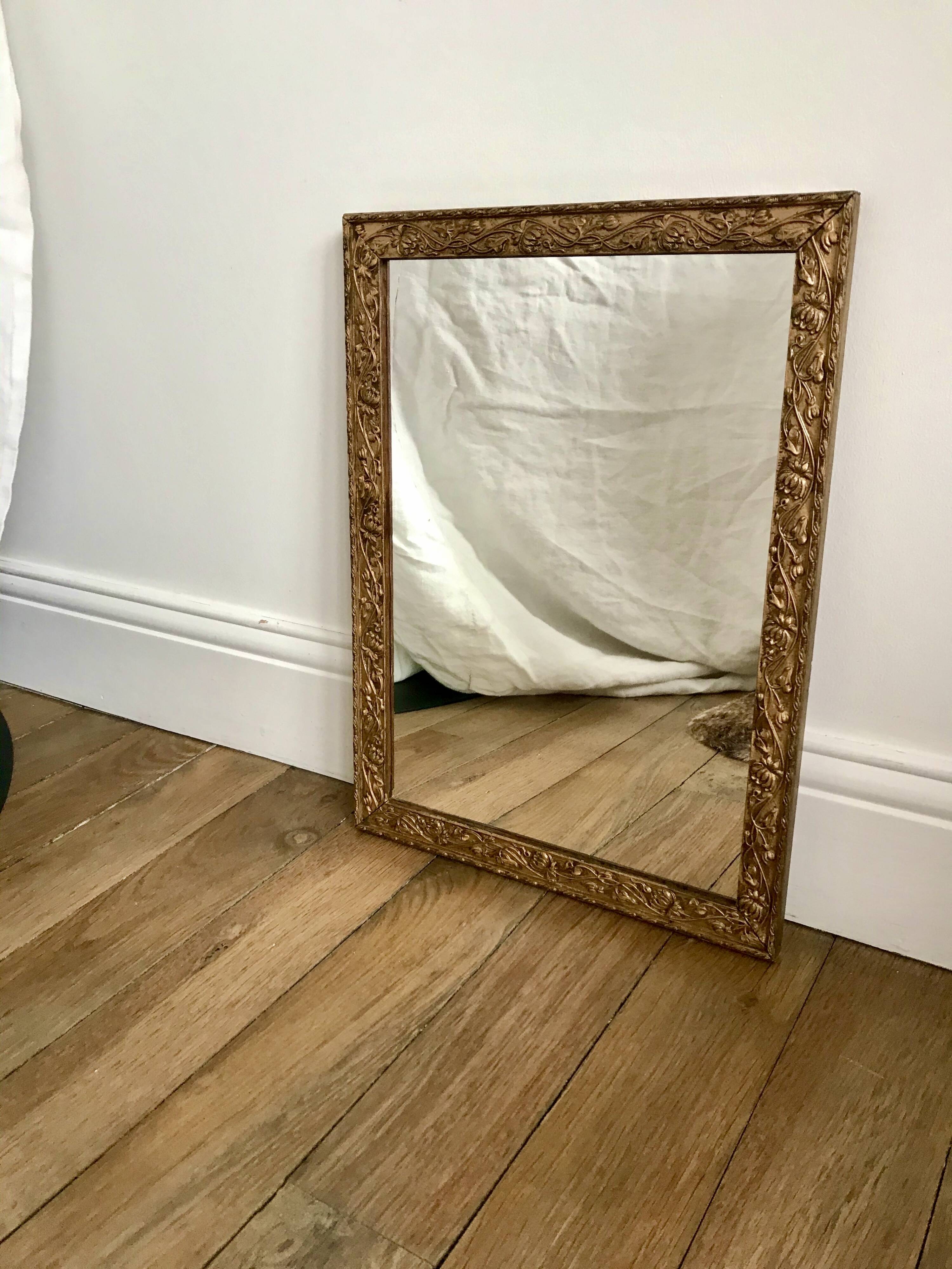 wooden and gilded stucco mirror early 20th century