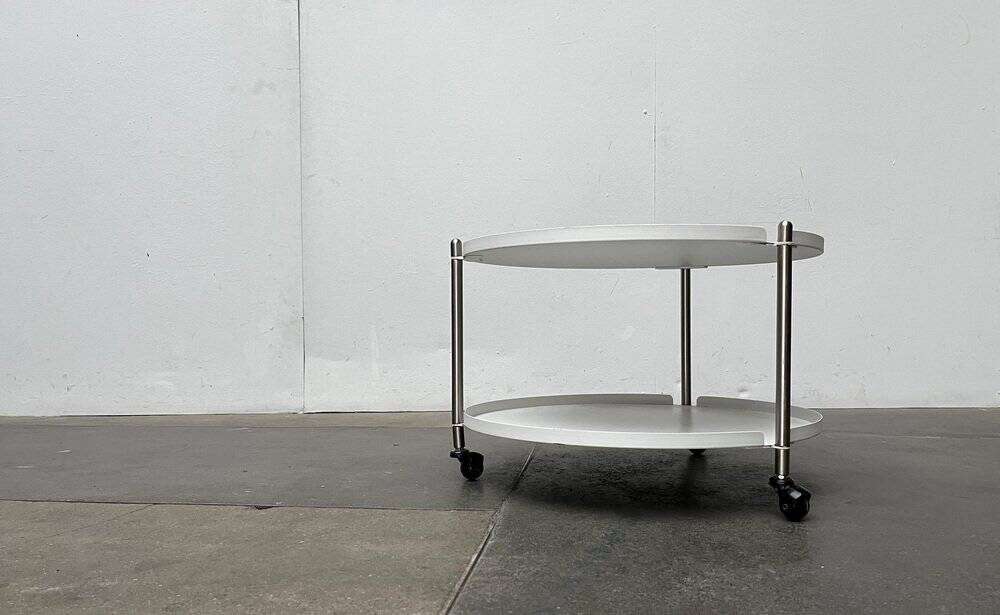 Minimalist Thrill metal coffee table or side table with wheels by Leitmotiv.