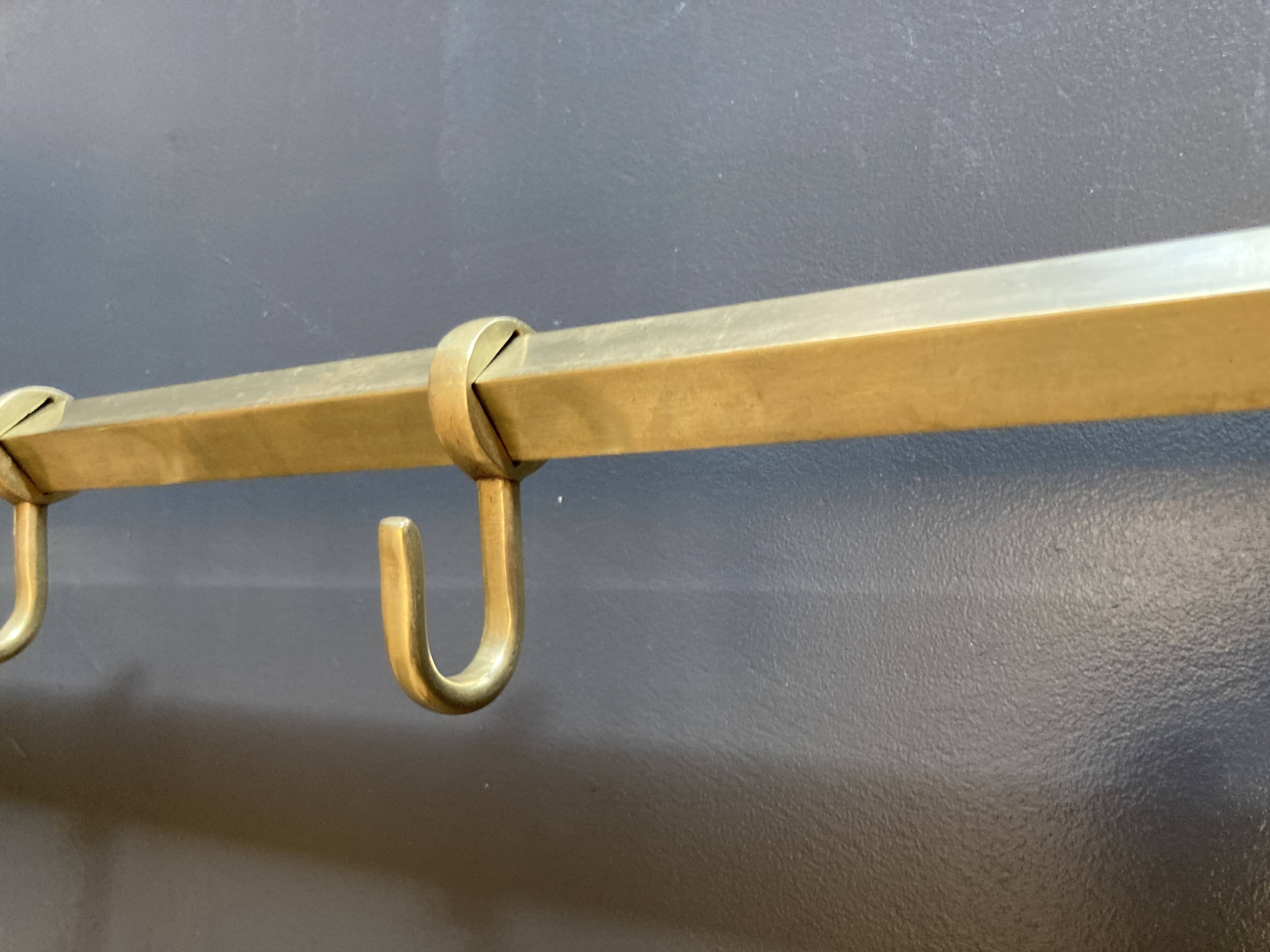 Art-deco wall-mounted coat rack in brass