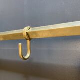 Art-deco wall-mounted coat rack in brass