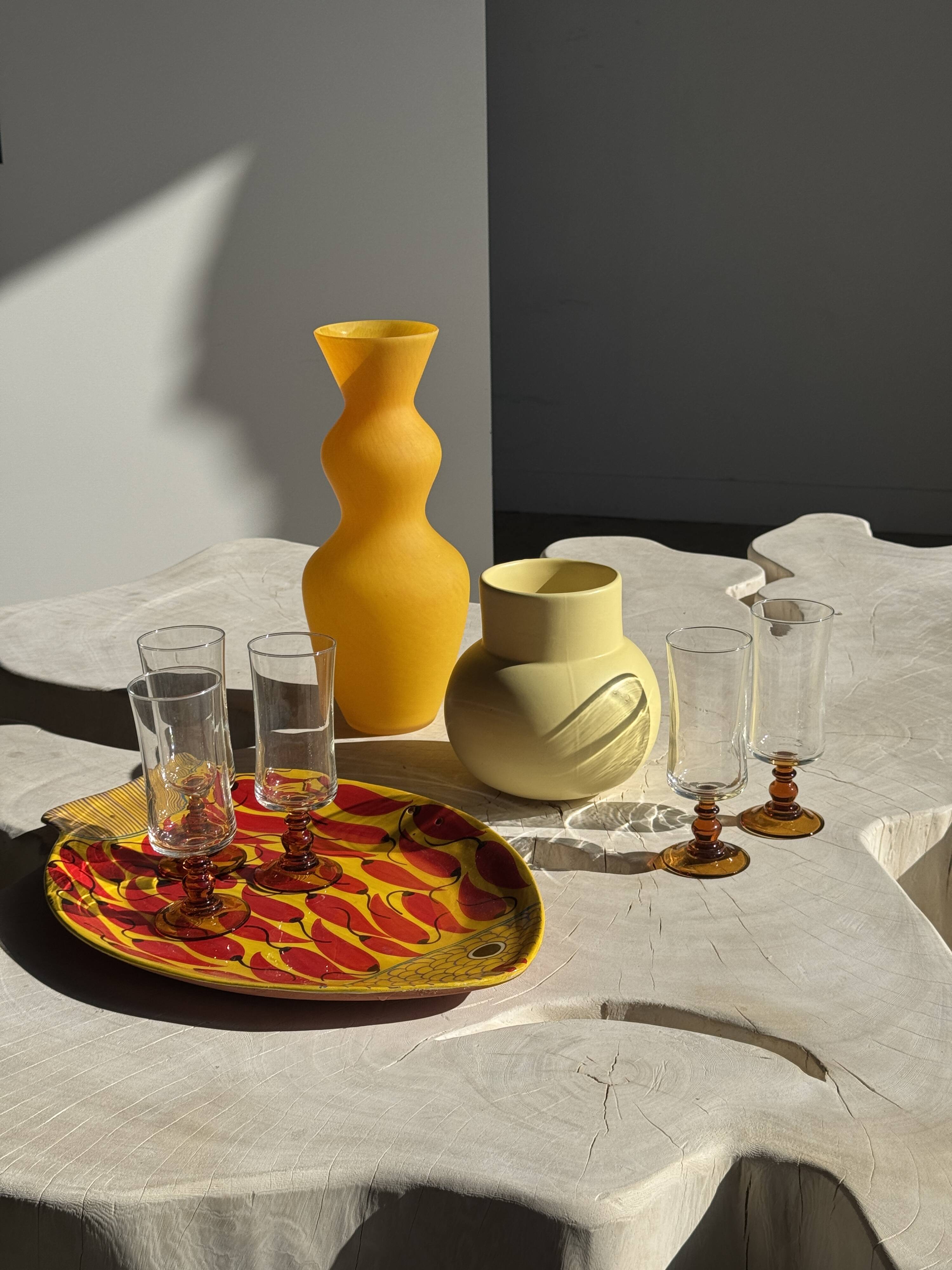 Small light yellow ball vase