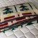 Wool blanket 230 X 250 with geometric patterns and 70's trees.
