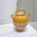 Old gargoulette pot in glazed terracotta