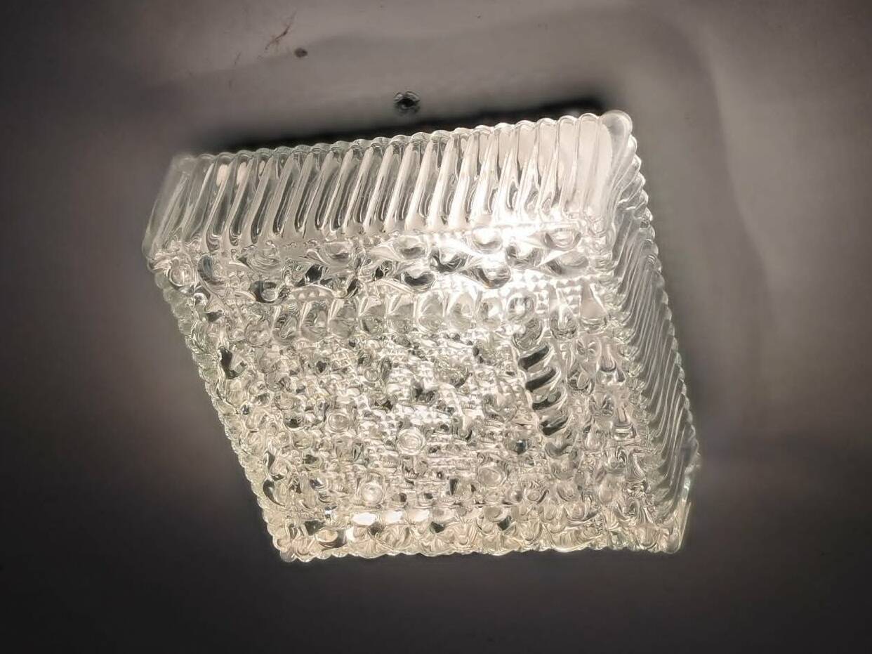 Square ceiling light made of moulded glass from the 1970s.