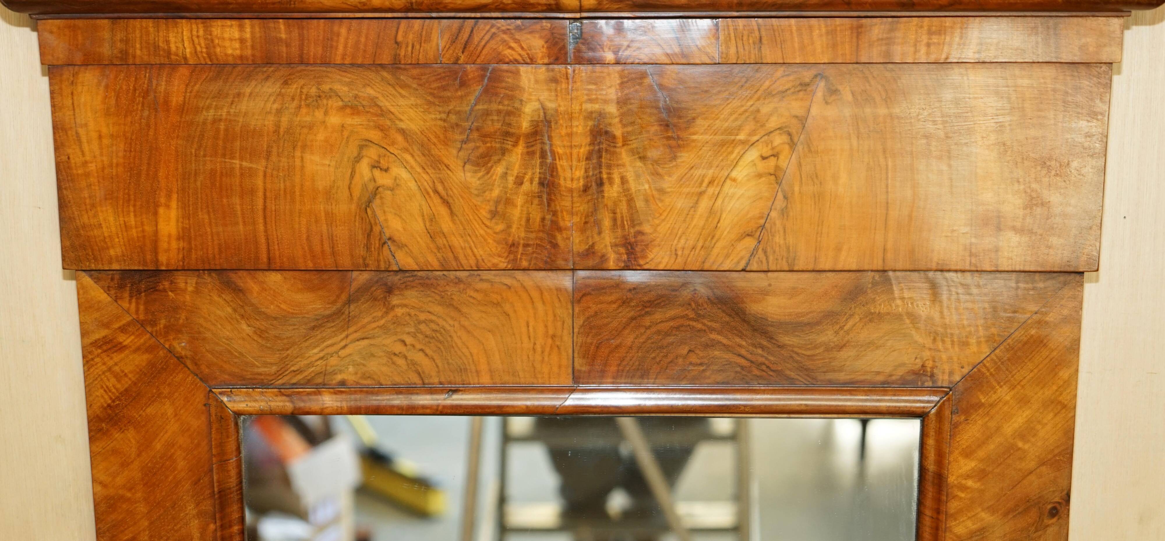 Pair of restored antique consoles from around 1815 in walnut, Regency style with mirror.
