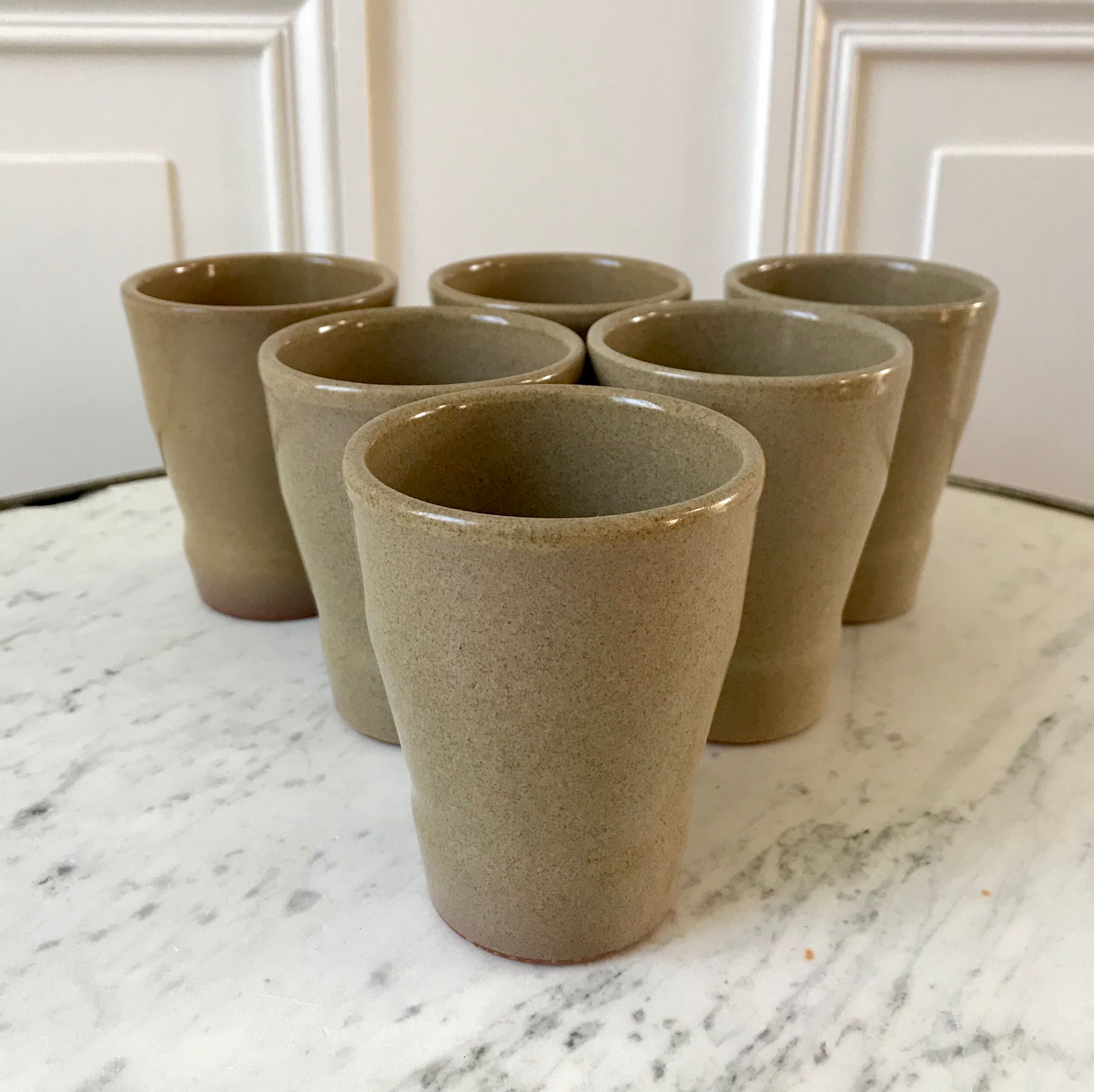 Lot of 6 light sandstone glasses