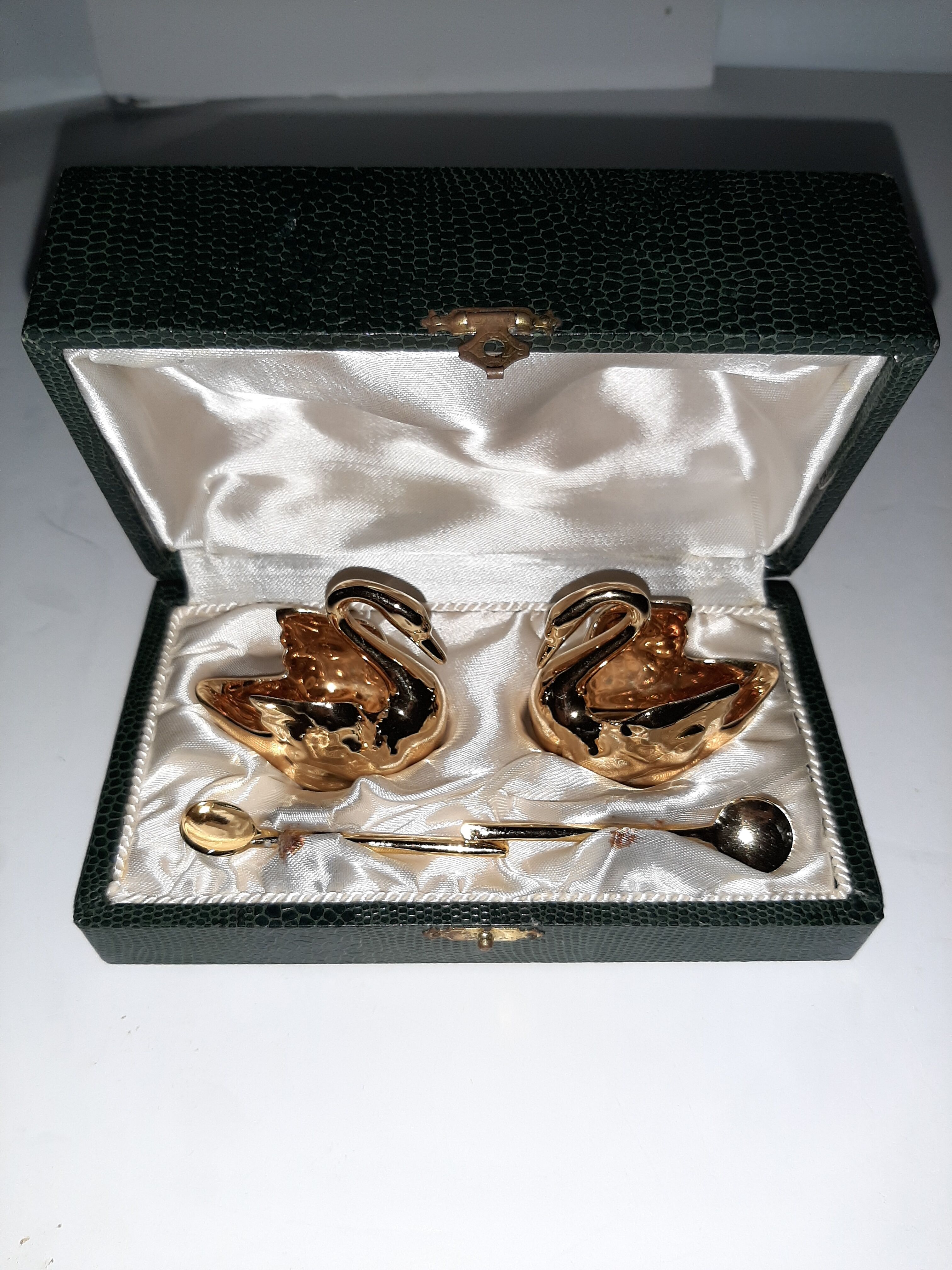 Pair of salerons Golden porcelain swans