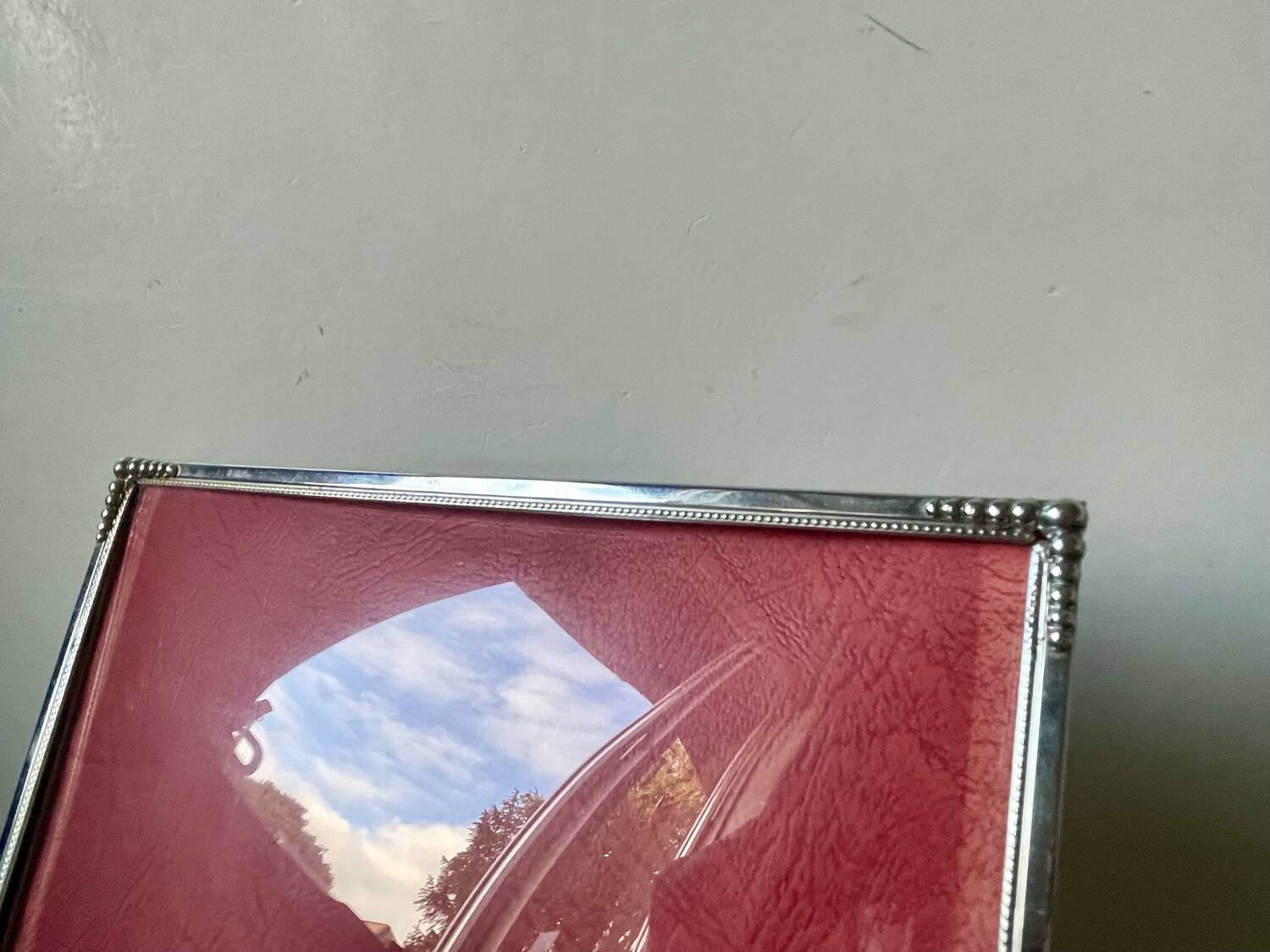 Art deco silver colored  metal frame  24.5  cm x 18.5 cm convex glass