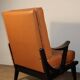 Paire de fauteuils vintage années 50 en bois noir et cuir caramel