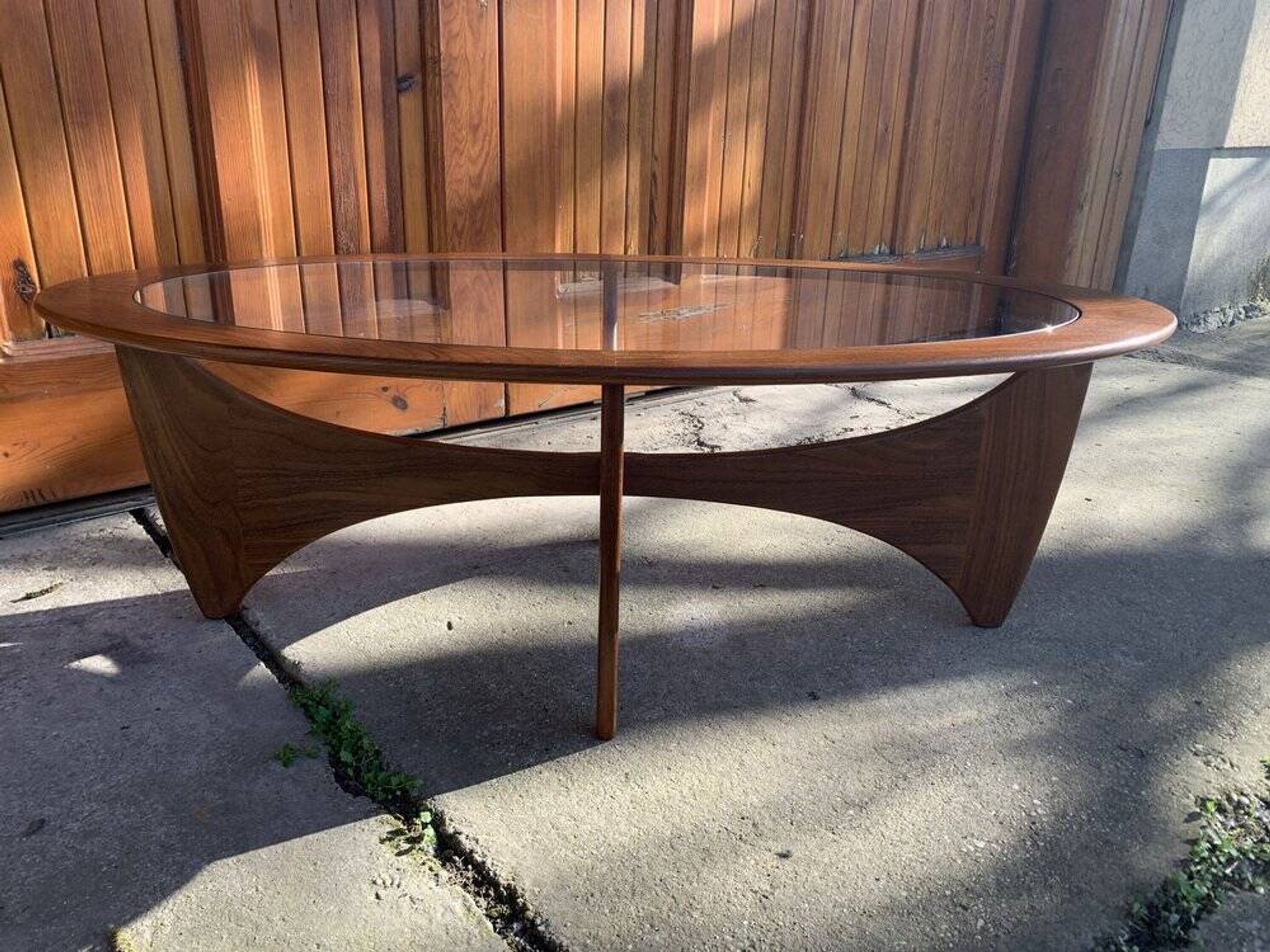 Astro oval coffee table in brown teak with glass top — Victor Wilkins, G-Plan (1960s)
