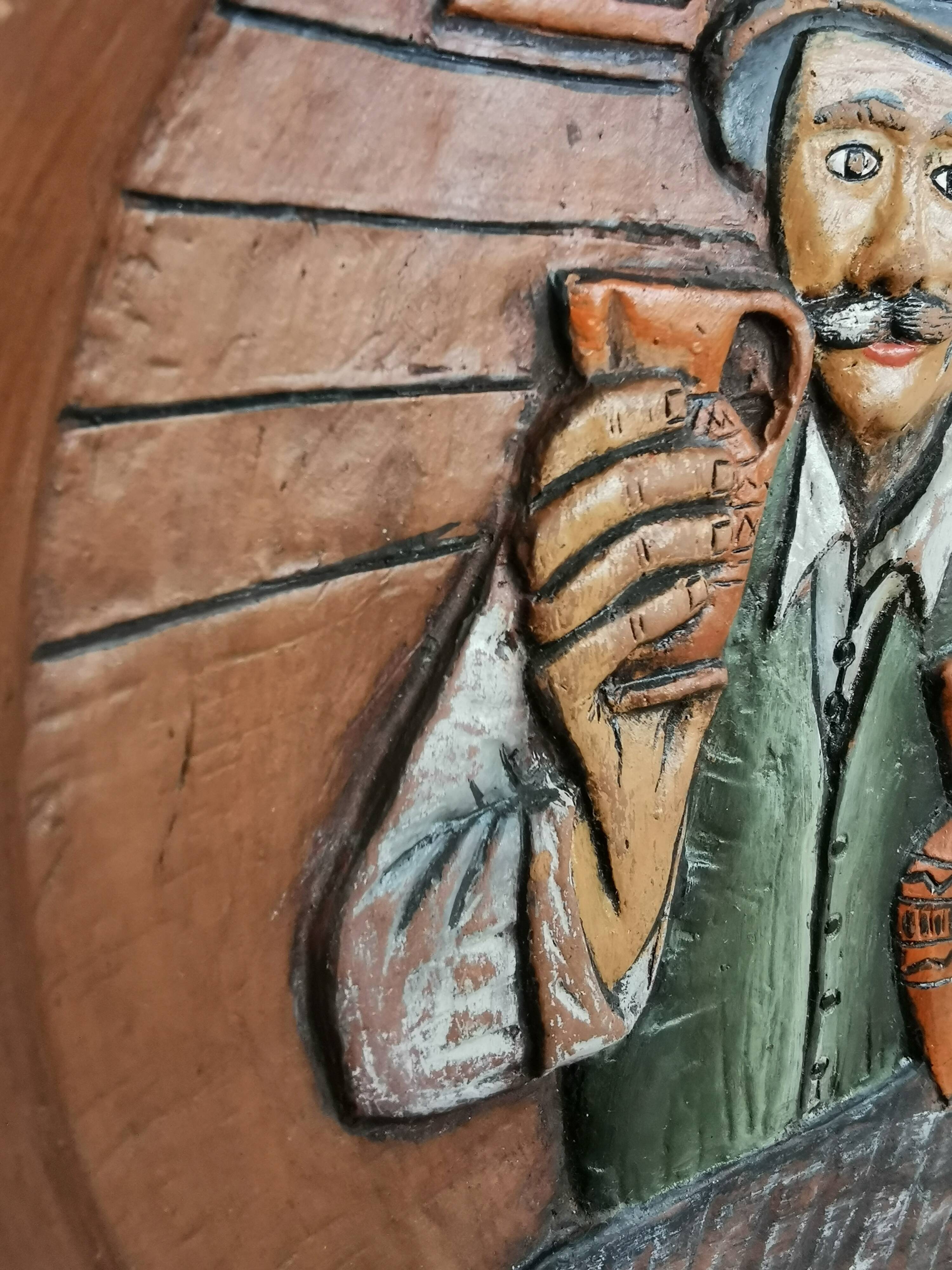 Vintage Embossed Clay Plate: Man Drinking, Retro Wall Decor