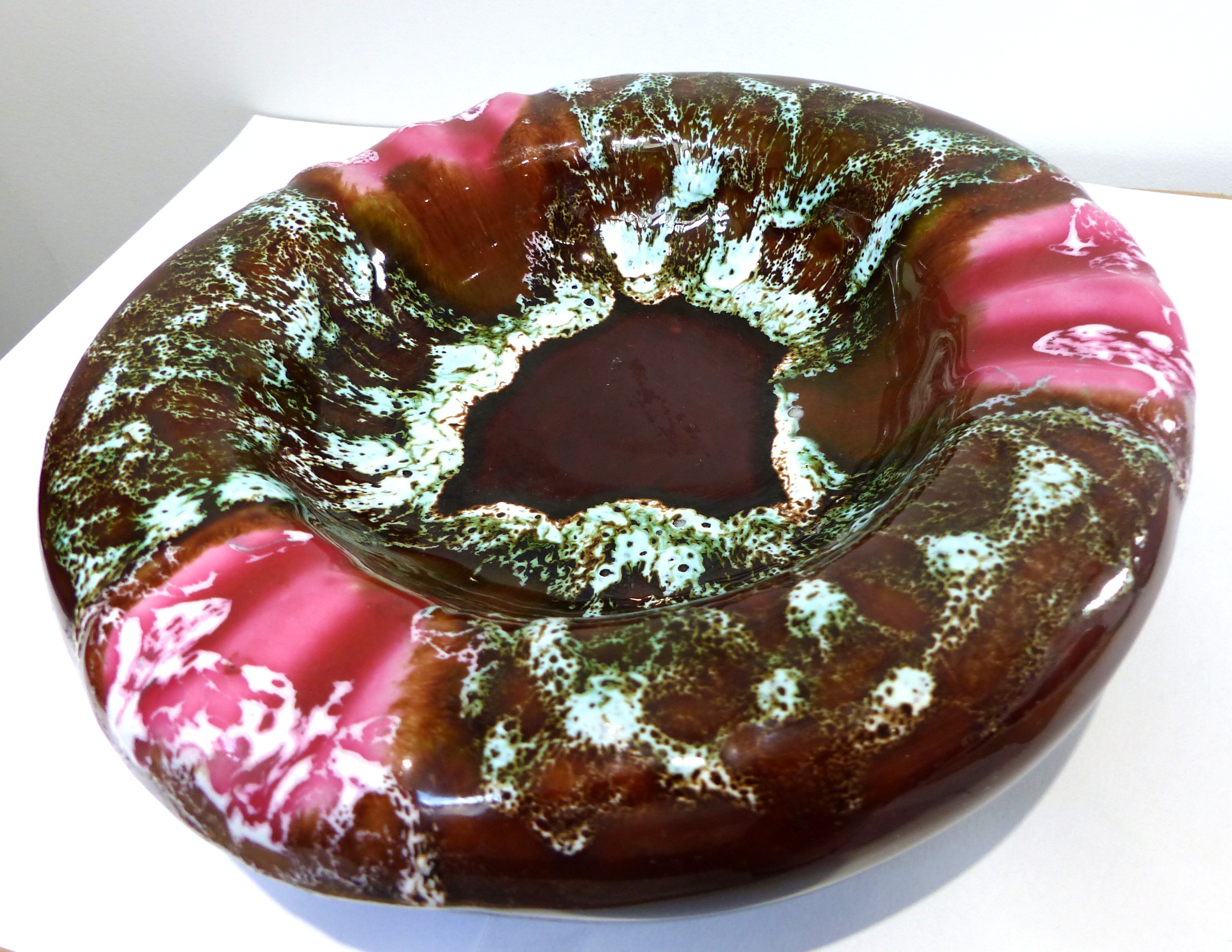 Old empty Vintage ceramic pocket pink tones, green white reflections