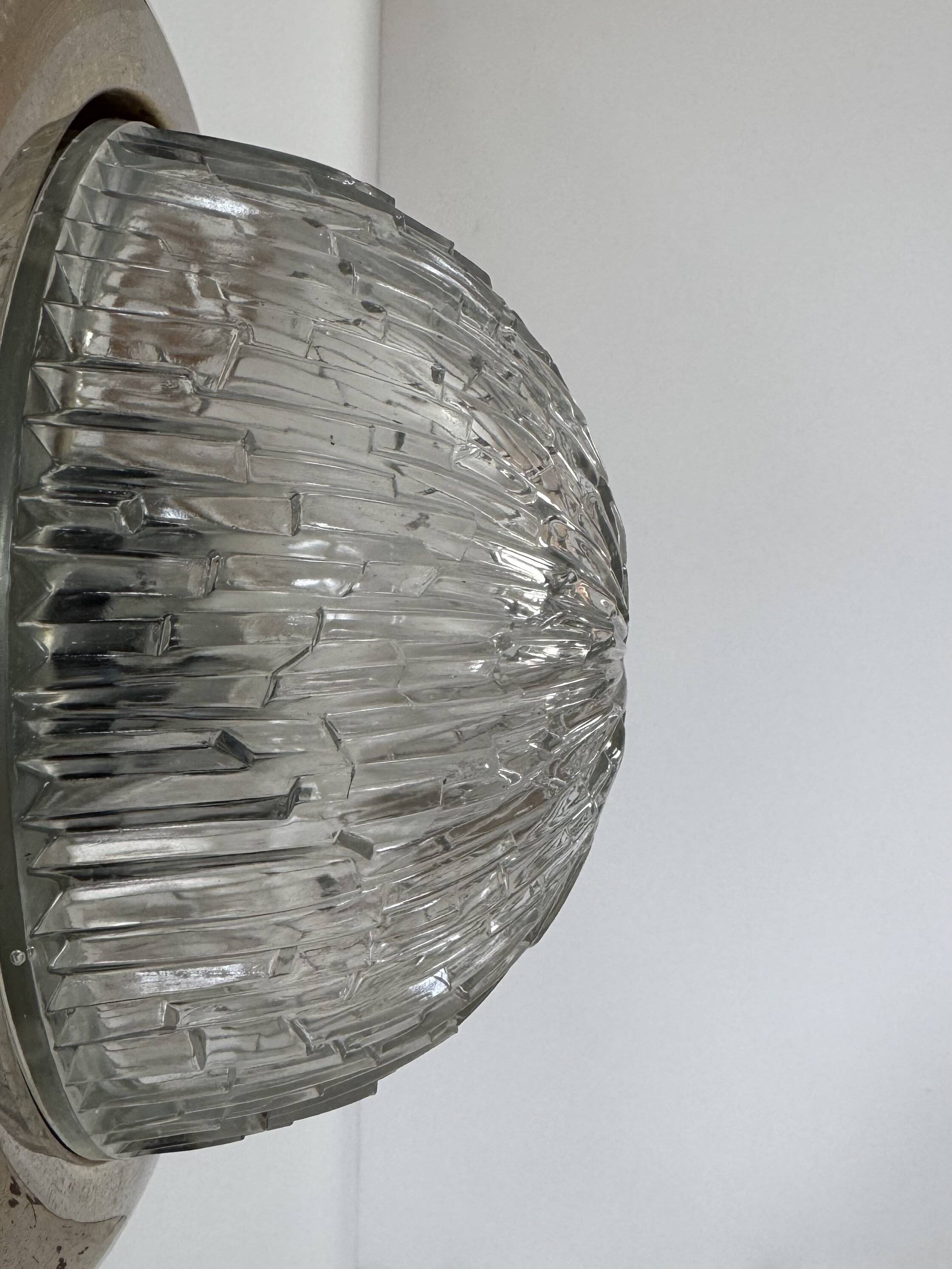 Pair of vintage wall lights, brass and pressed moulded glass, France, 1960.