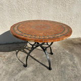 Round garden table in mosaic and iron