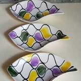 Three vintage free-form ceramic ravine dishes from the 1950s