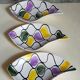 Three vintage free-form ceramic ravine dishes from the 1950s