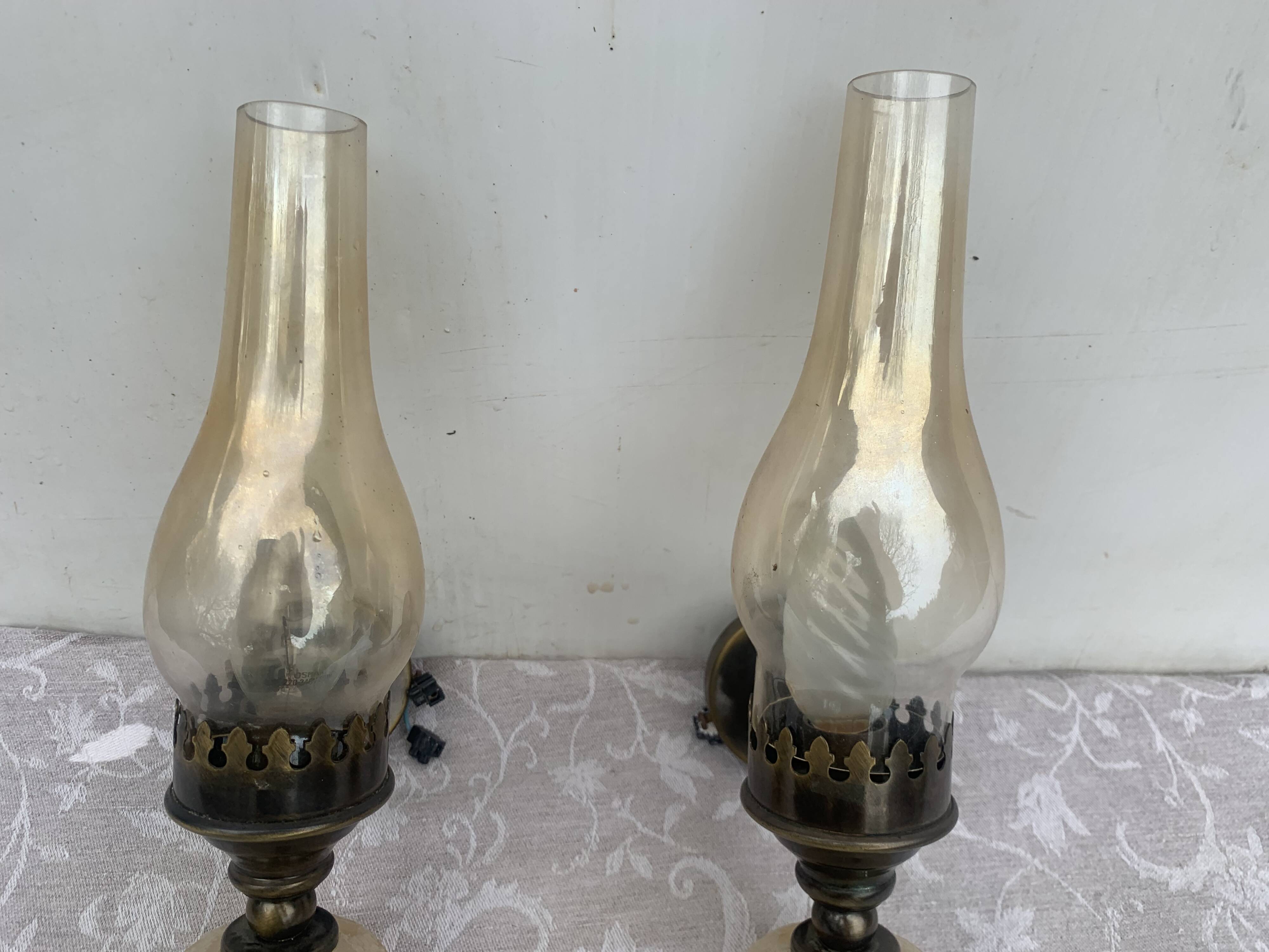 Matching pair of bronze wall sconces oil lamp style