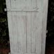 Small solid antique wooden shutter, 104cm high x 54cm wide
