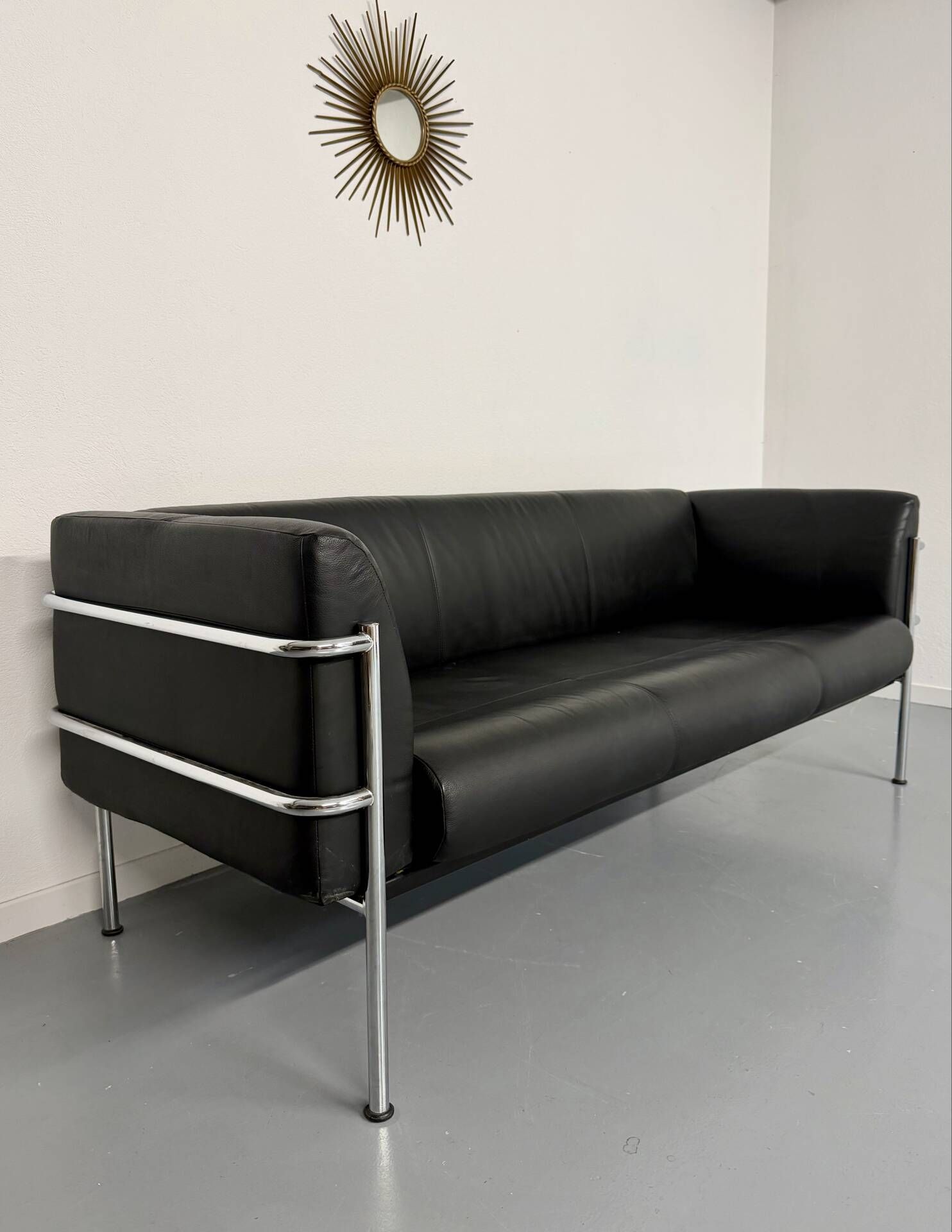 Three-seater tubular chrome and black leather sofa by Kébé, Denmark 80